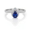 0.70 CT Sapphire Pear Cut and Round Cut Diamond Ring
