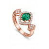 0.76 CT Emerald Oval Cut and Round Cut Diamond Ring