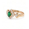 0.76 CT Emerald Oval Cut and Round Cut Diamond Ring