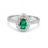 0.75 CT Emerald Oval Cut and Round Cut Diamond Ring