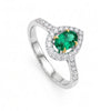 0.75 CT Emerald Oval Cut and Round Cut Diamond Ring