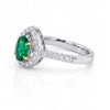 0.75 CT Emerald Oval Cut and Round Cut Diamond Ring